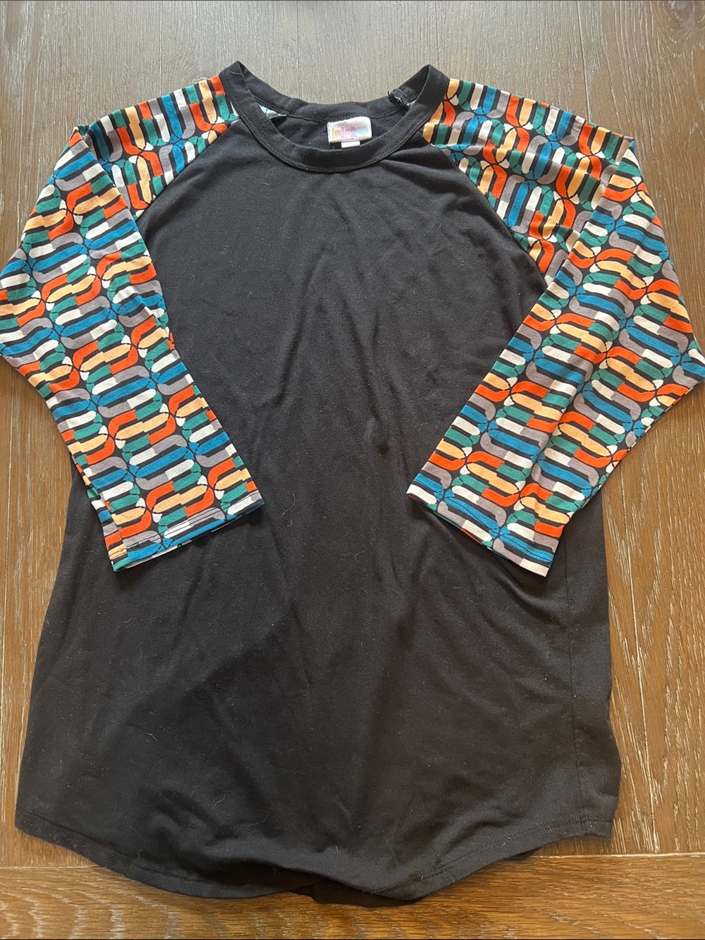 LuLaRoe Black Raglan Shirt with Colorful Patterned Sleeves